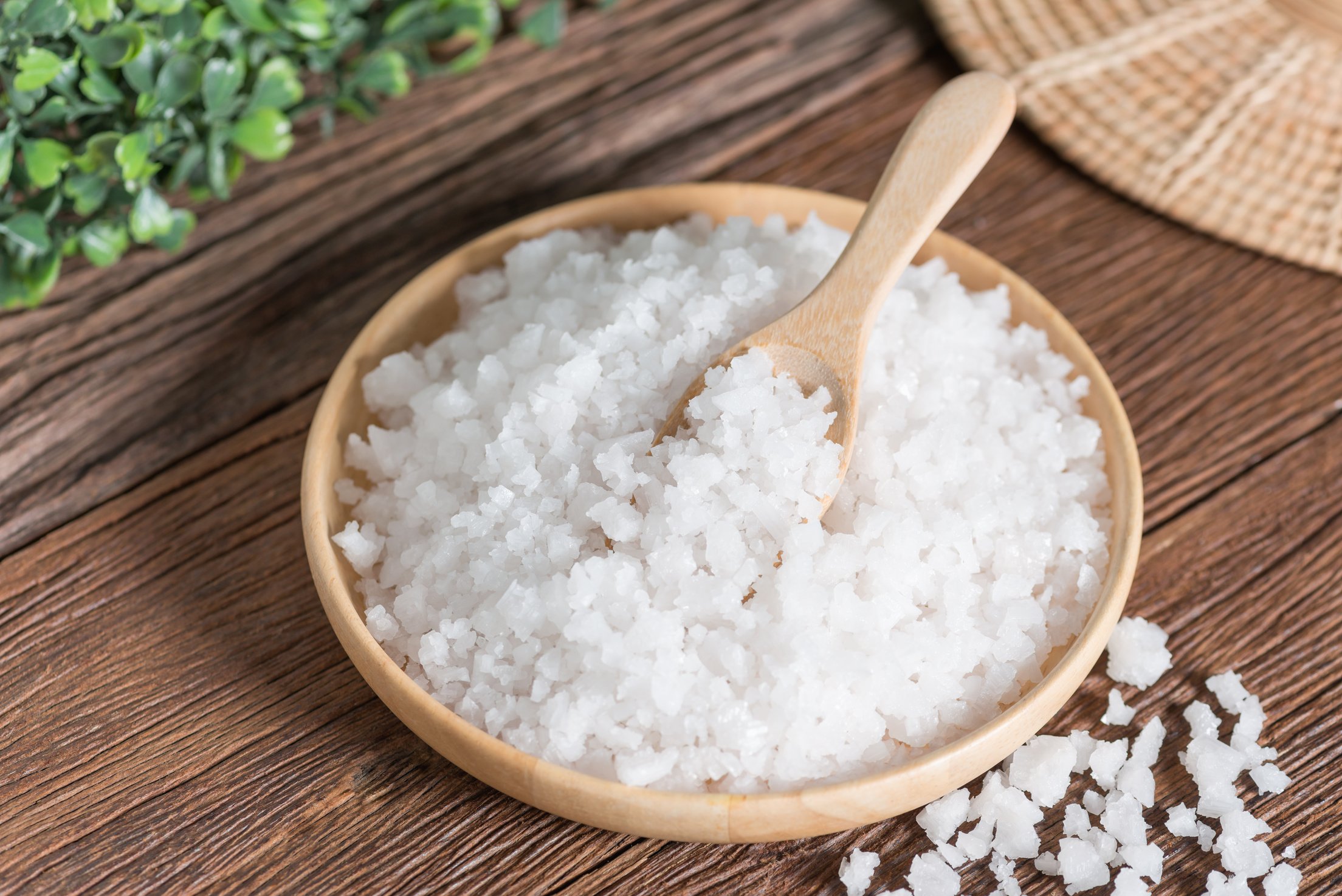 Sea salt in wood plate.